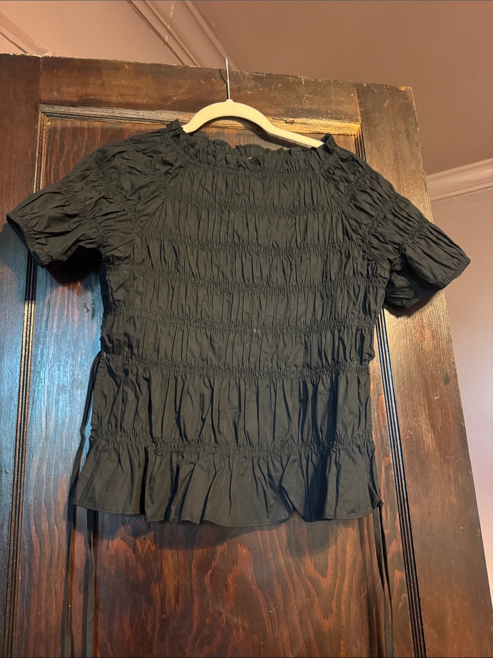 Black Smocked Short Sleeve Peplum Blouse